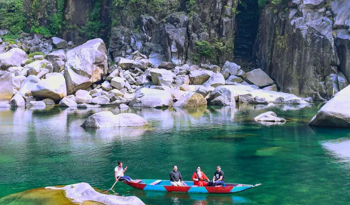 Boating on the crystal-clear Umngot river at Dawki