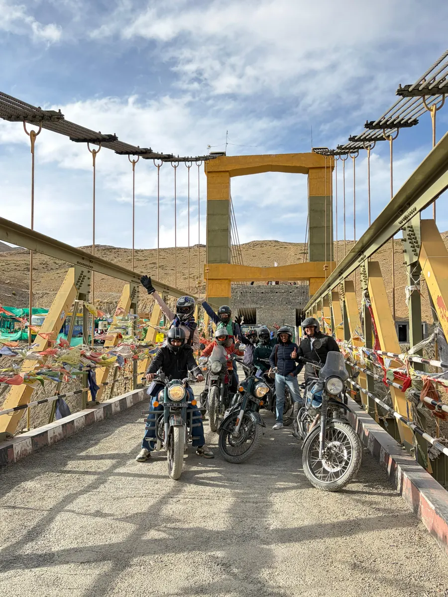 TripoMusafir riders at Chicham Bridge, Asia's highest suspension bridge
