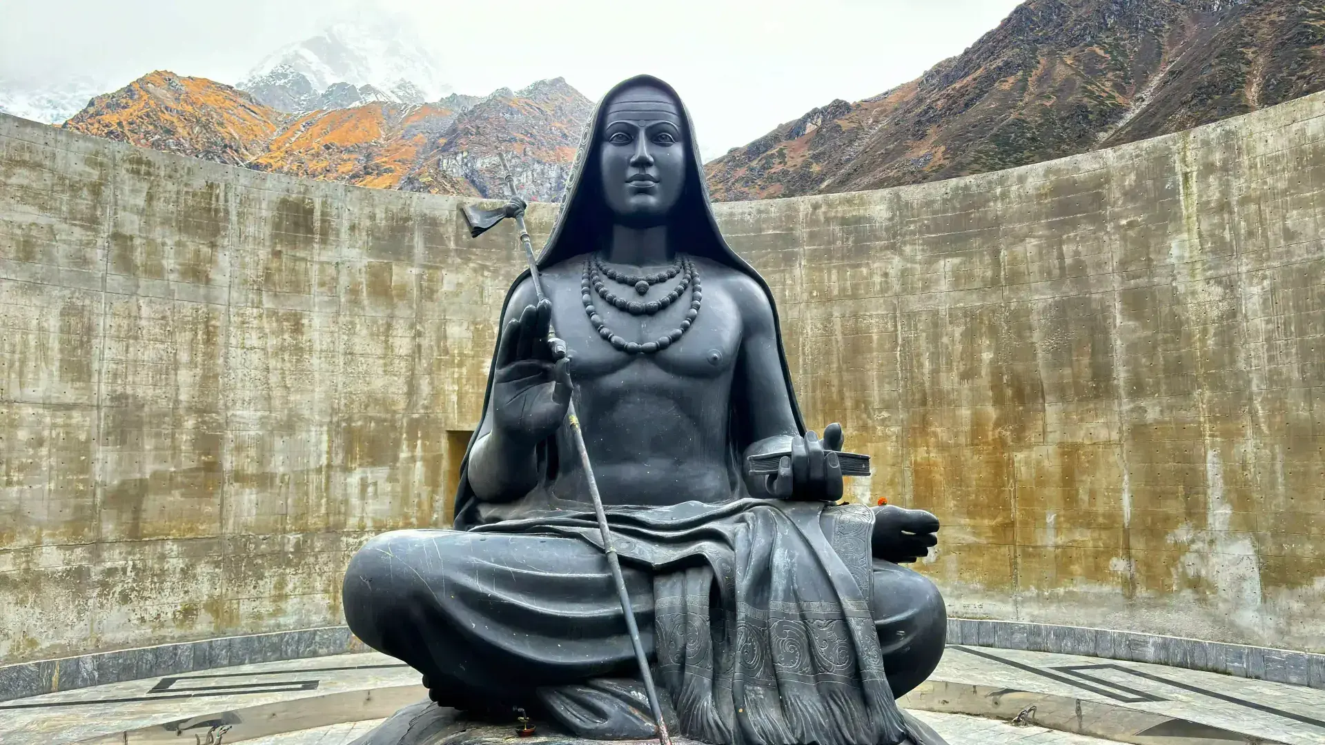 The Kedarnath temple set among snow capped Himalayan peaks