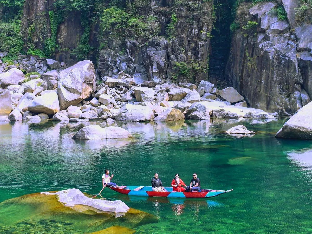 Boating on the crystal-clear Umngot river at Dawki, Meghalaya