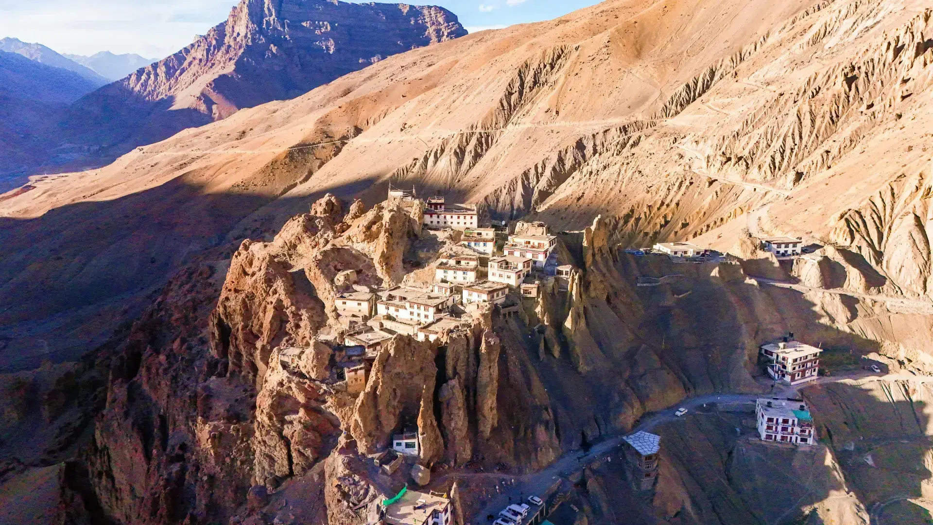Aerial view of a Spiti village built into a cliffside