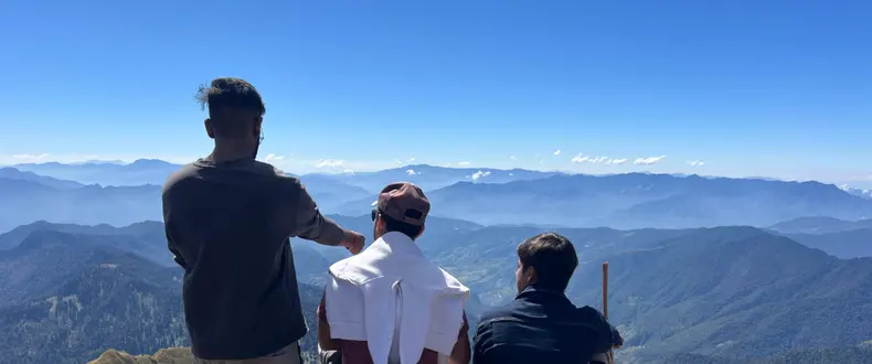 Trekkers taking in the Garhwal Himalayan view